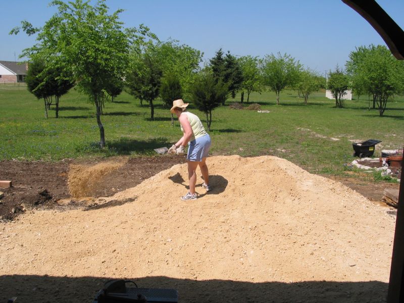 Michelle in action: Heaving some gravel.