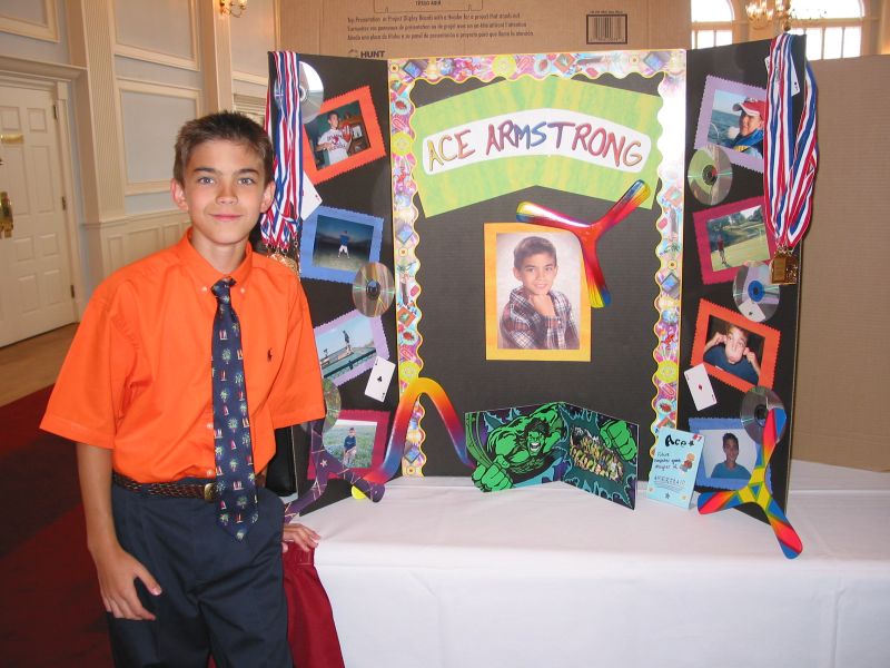 Boomerangs and boomerang tournament medals decorate Ace's display.