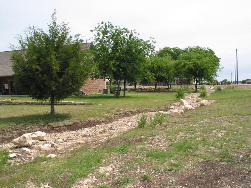 Dry creek bed with new large boulders