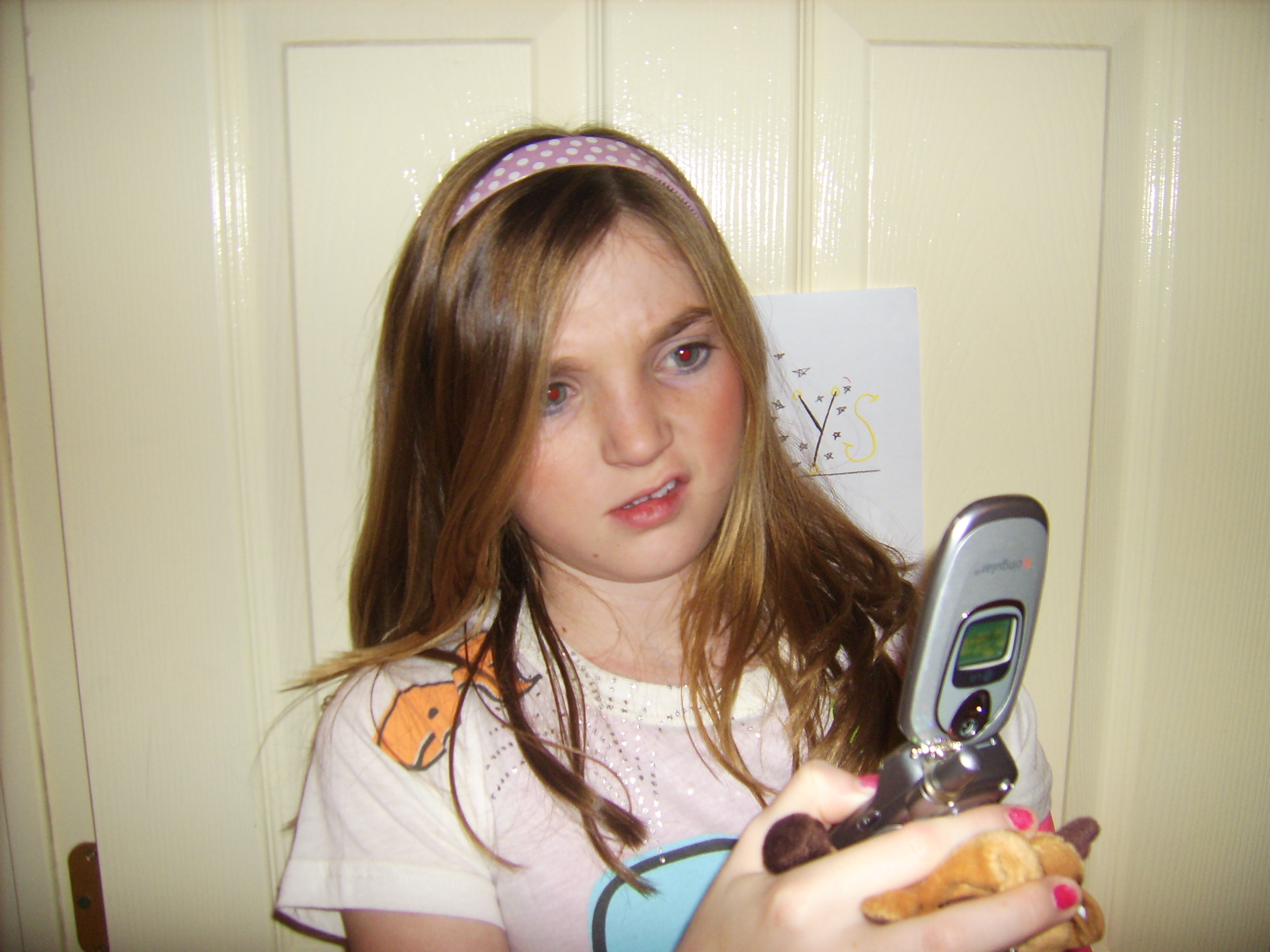 Taylor is confused by her cell phone