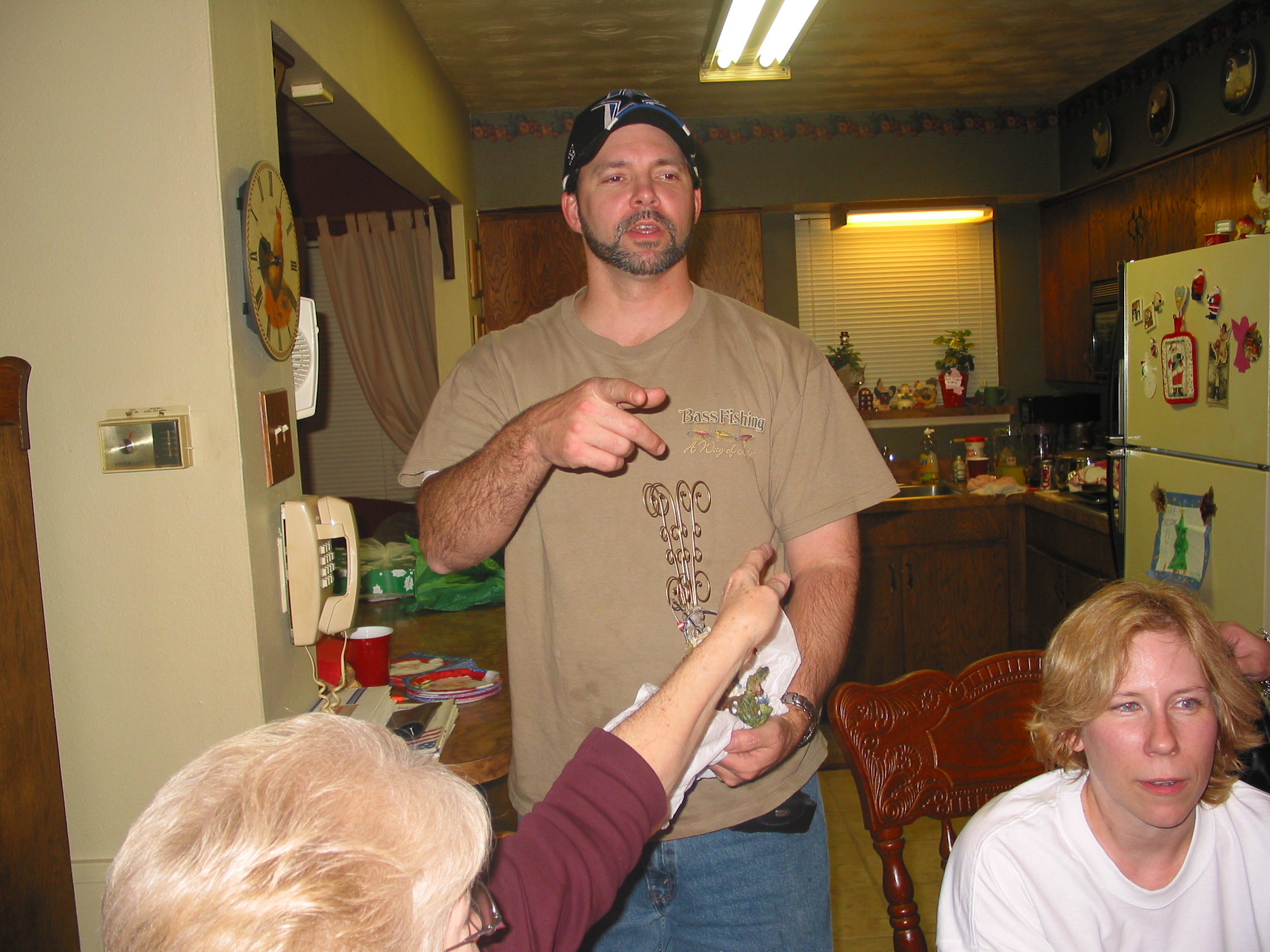 Joey lectures the kids on proper gift-opening technique.