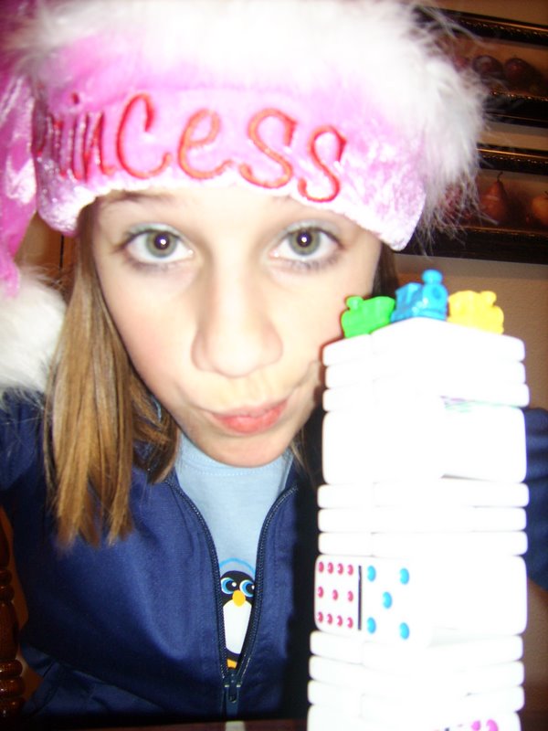 Holly with a domino tower