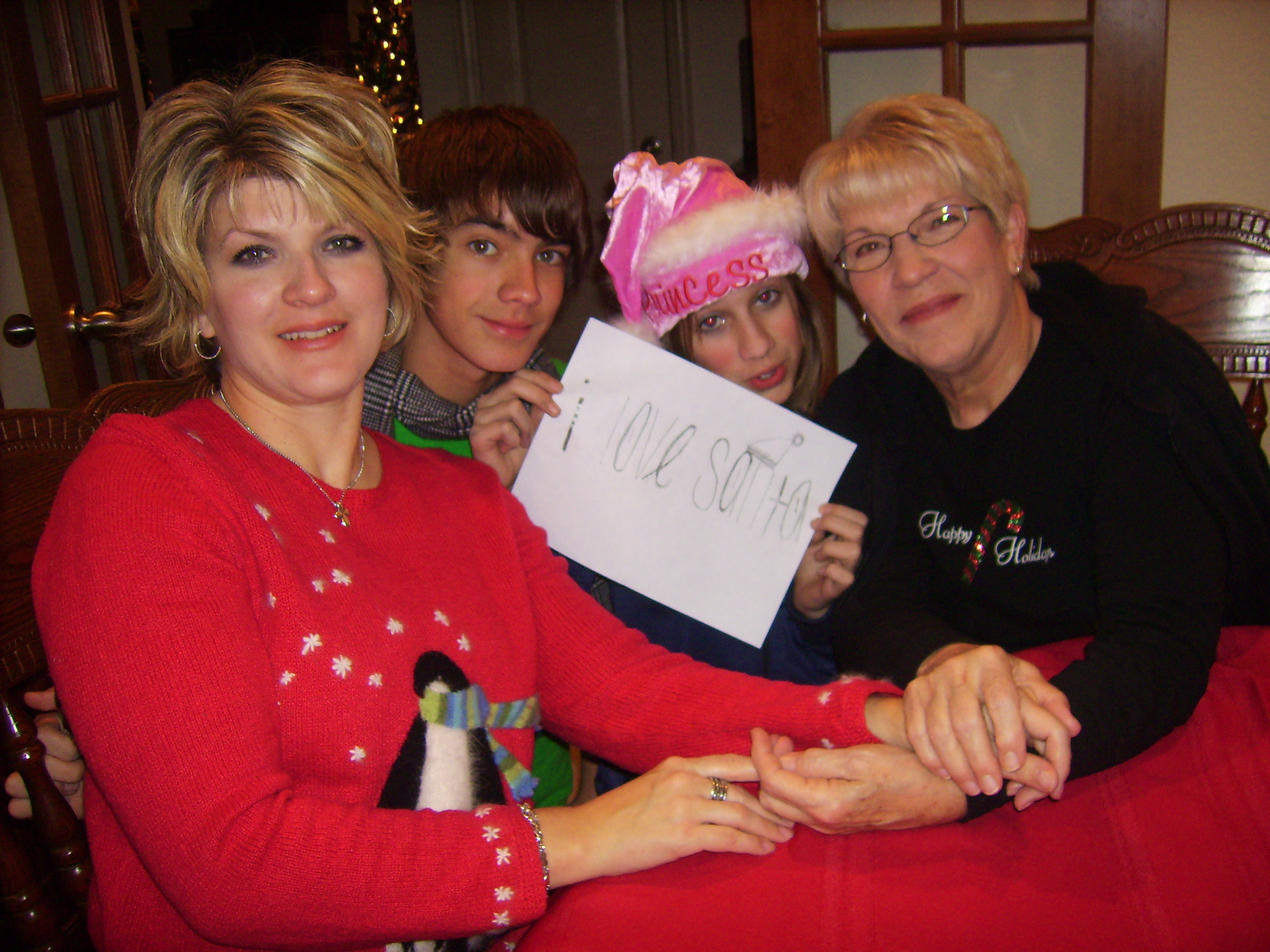 Michelle, Andrew, Holly, and Loretta with a message to Santa