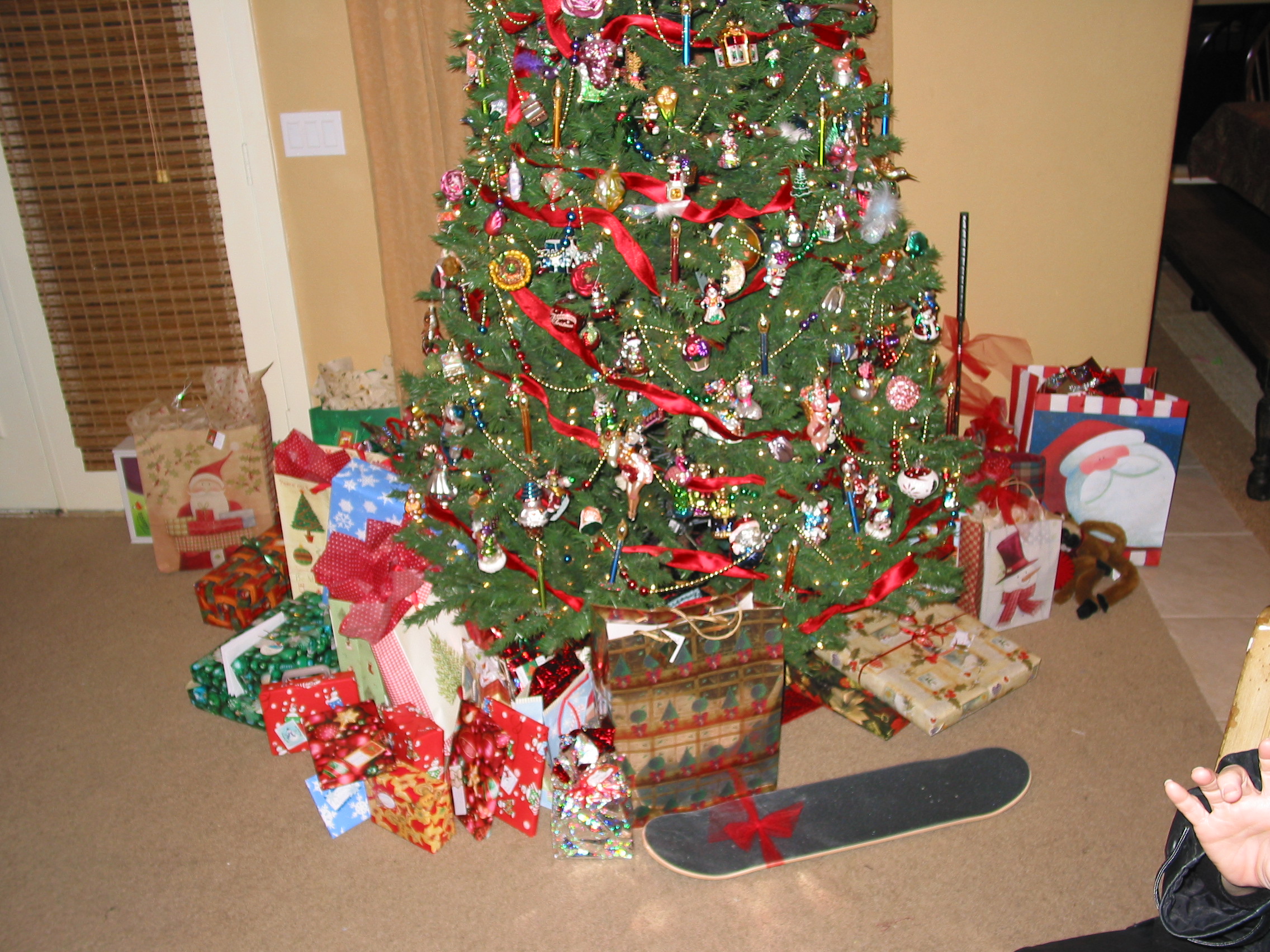 A replenished pile of gifts under the Armstrong Christmas tree-1