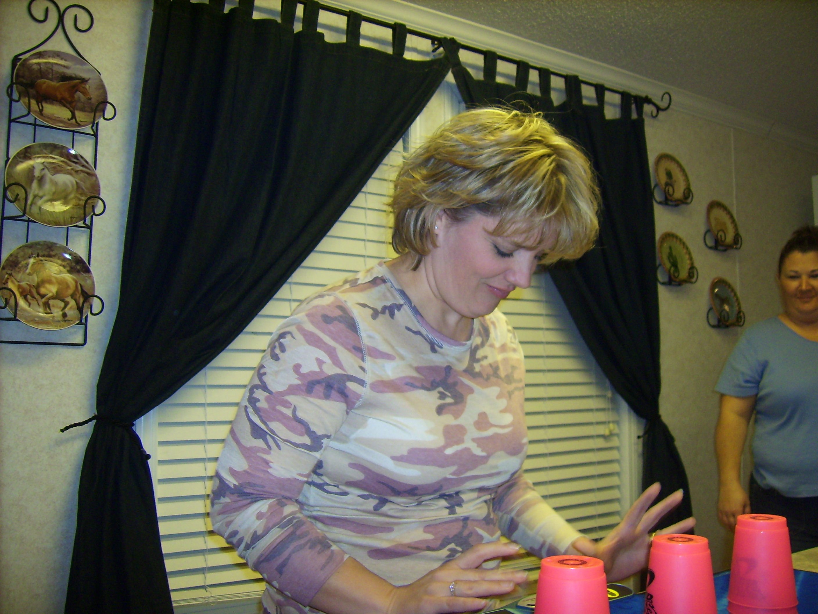 Chris is serious about her cup stacking