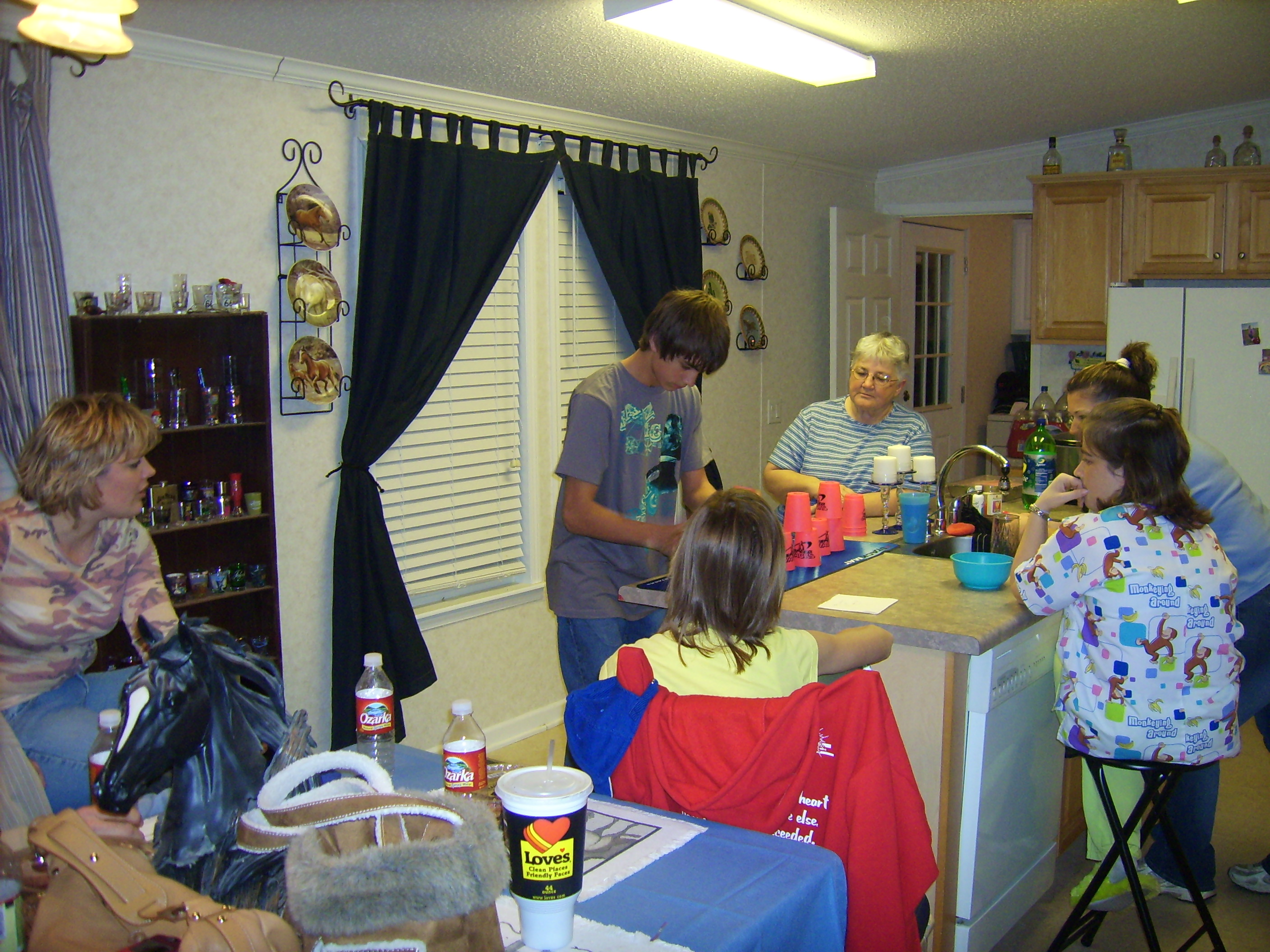 A huge crowd watches Andrew stacking cups
