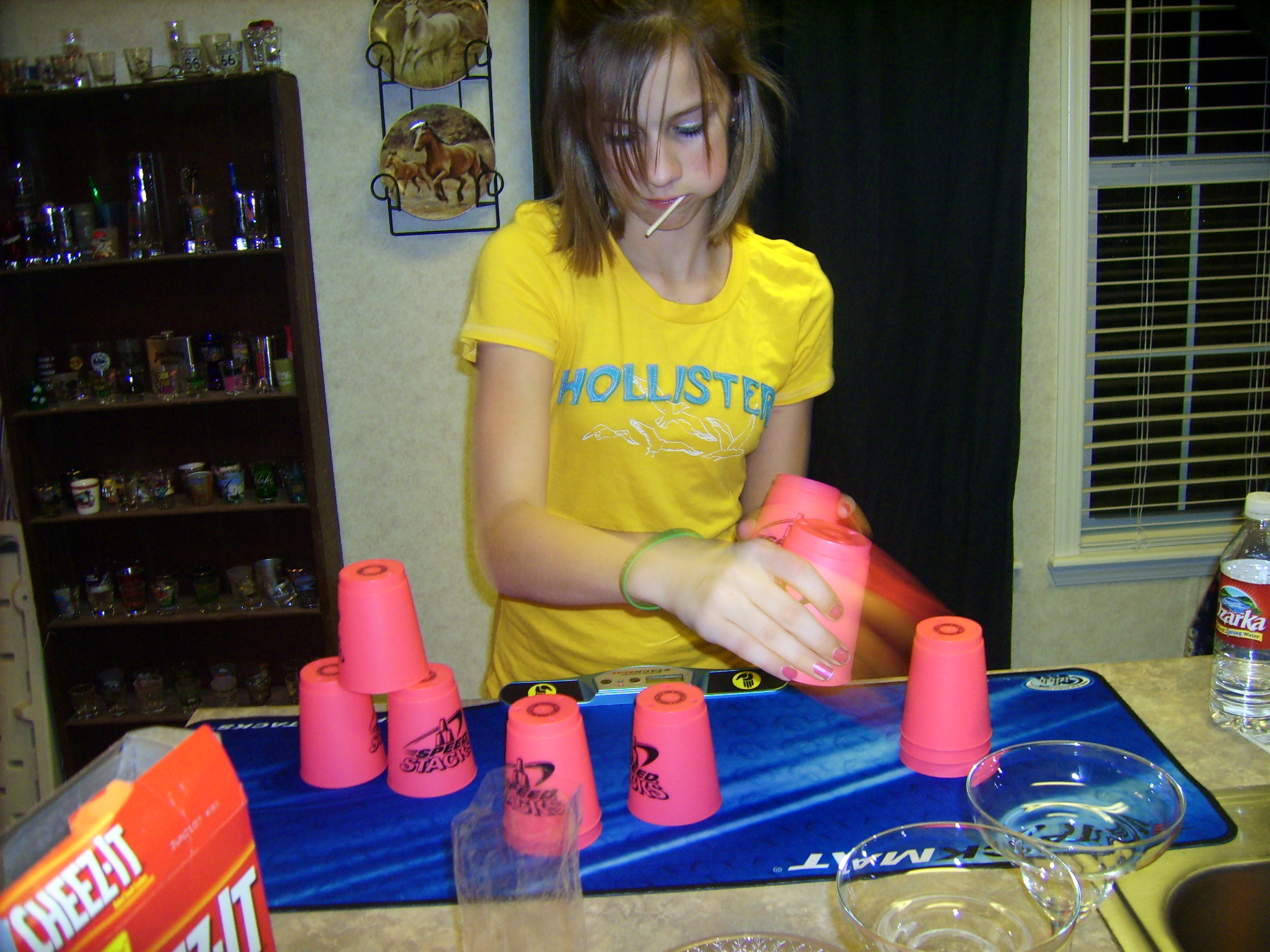 Holly's cup stacking moves are a blur of speed