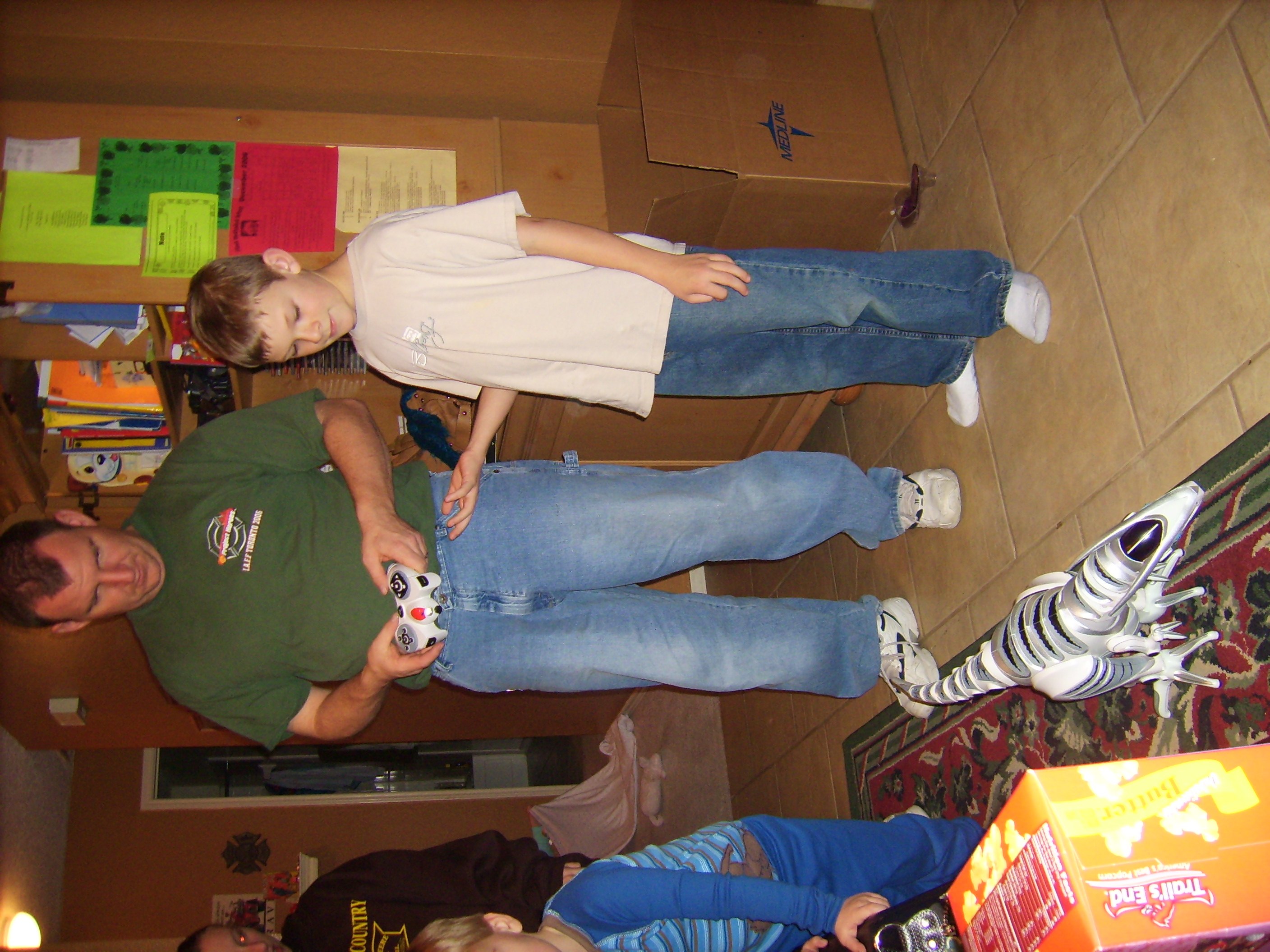 Joe remote controls a dinosaur