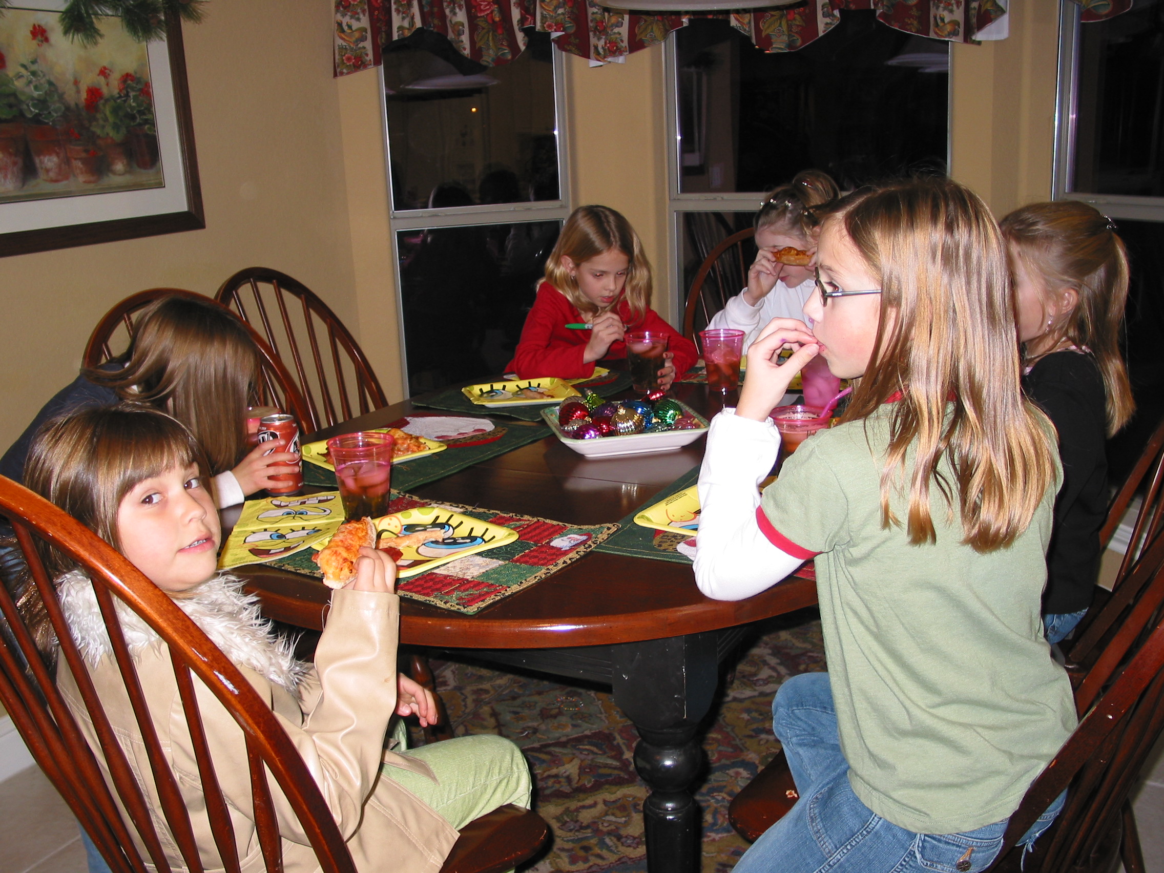 The girls start off the evening with some delicious pizza.