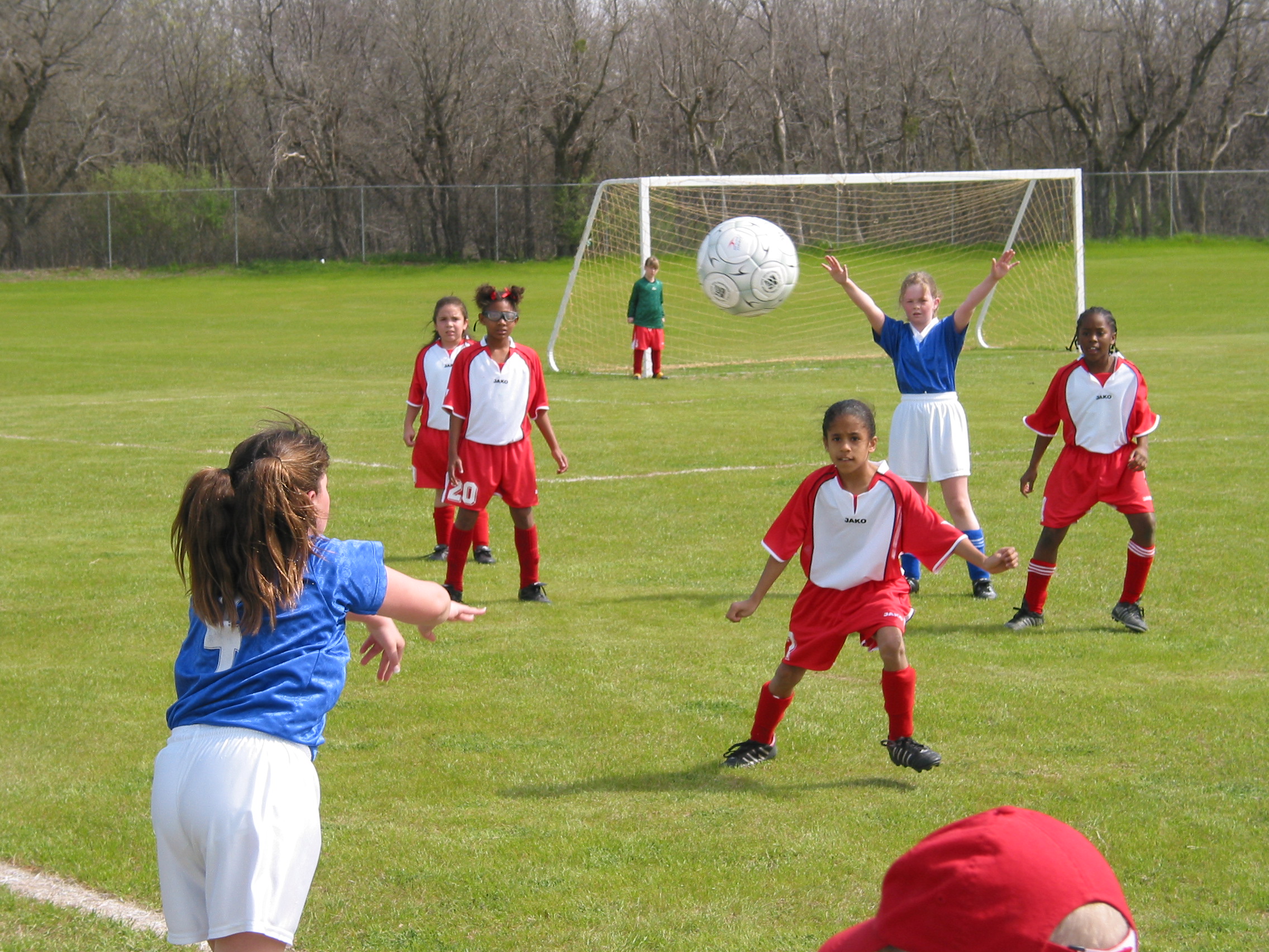 Number 4 throws the ball in.