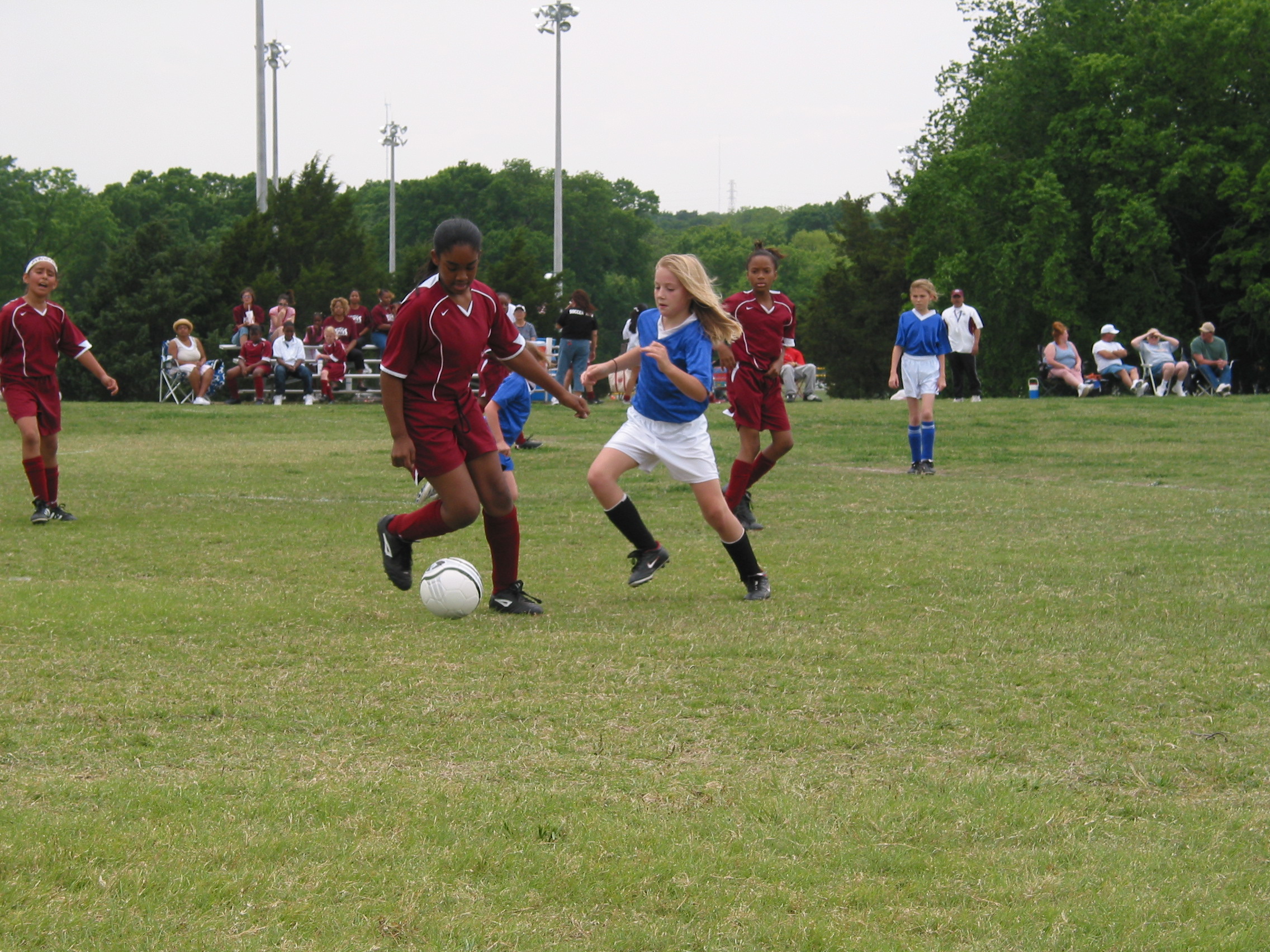 Lexi is about to take this ball away.