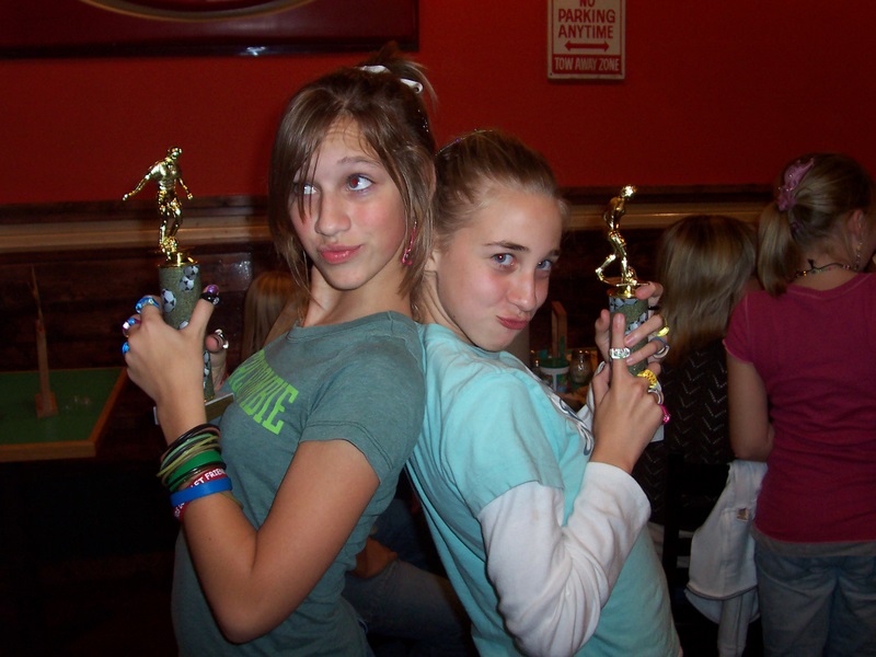 Holly and Macie with their trophies