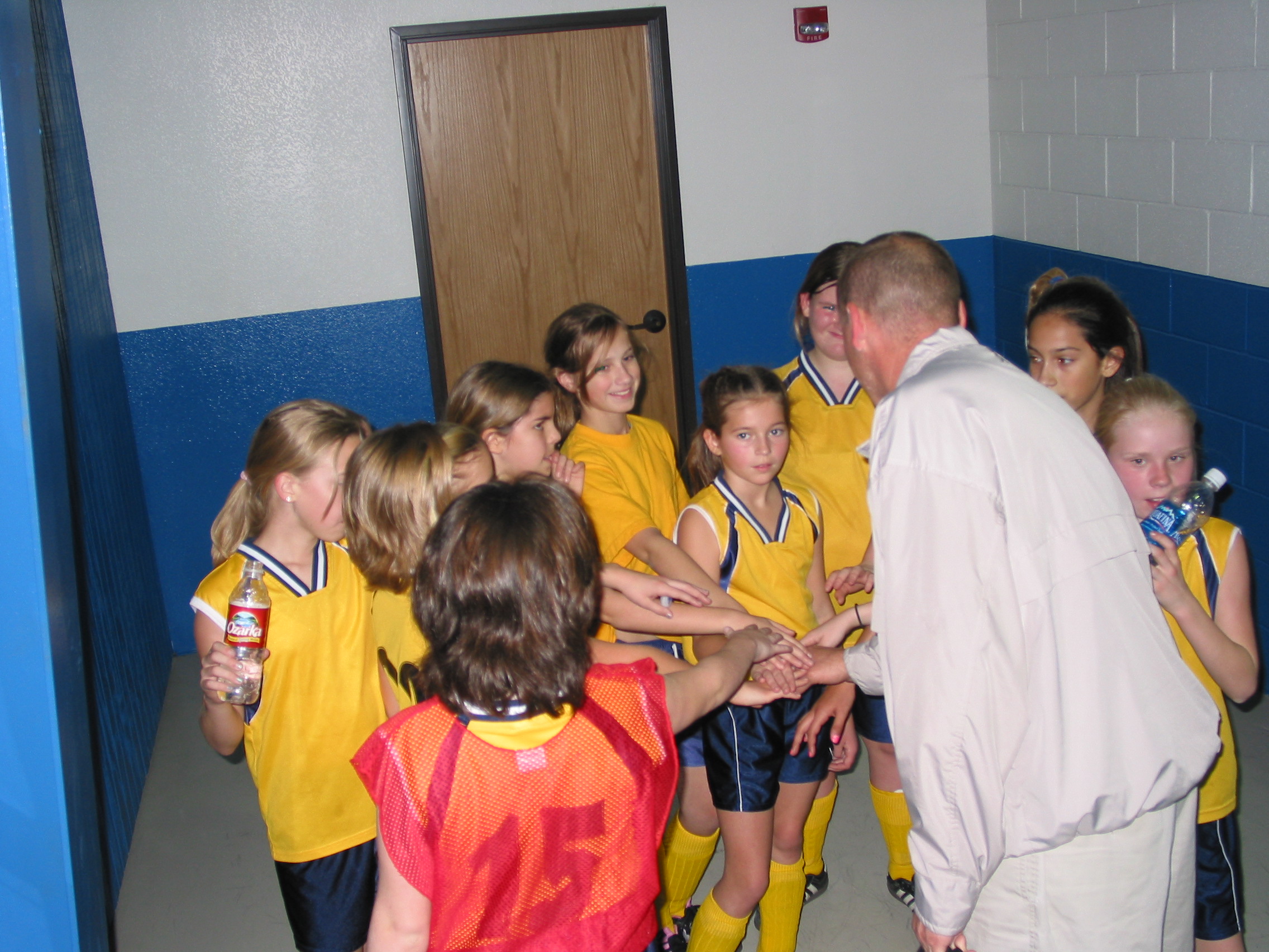 OK, everybody: Hands in... Lady... STRIKERS!