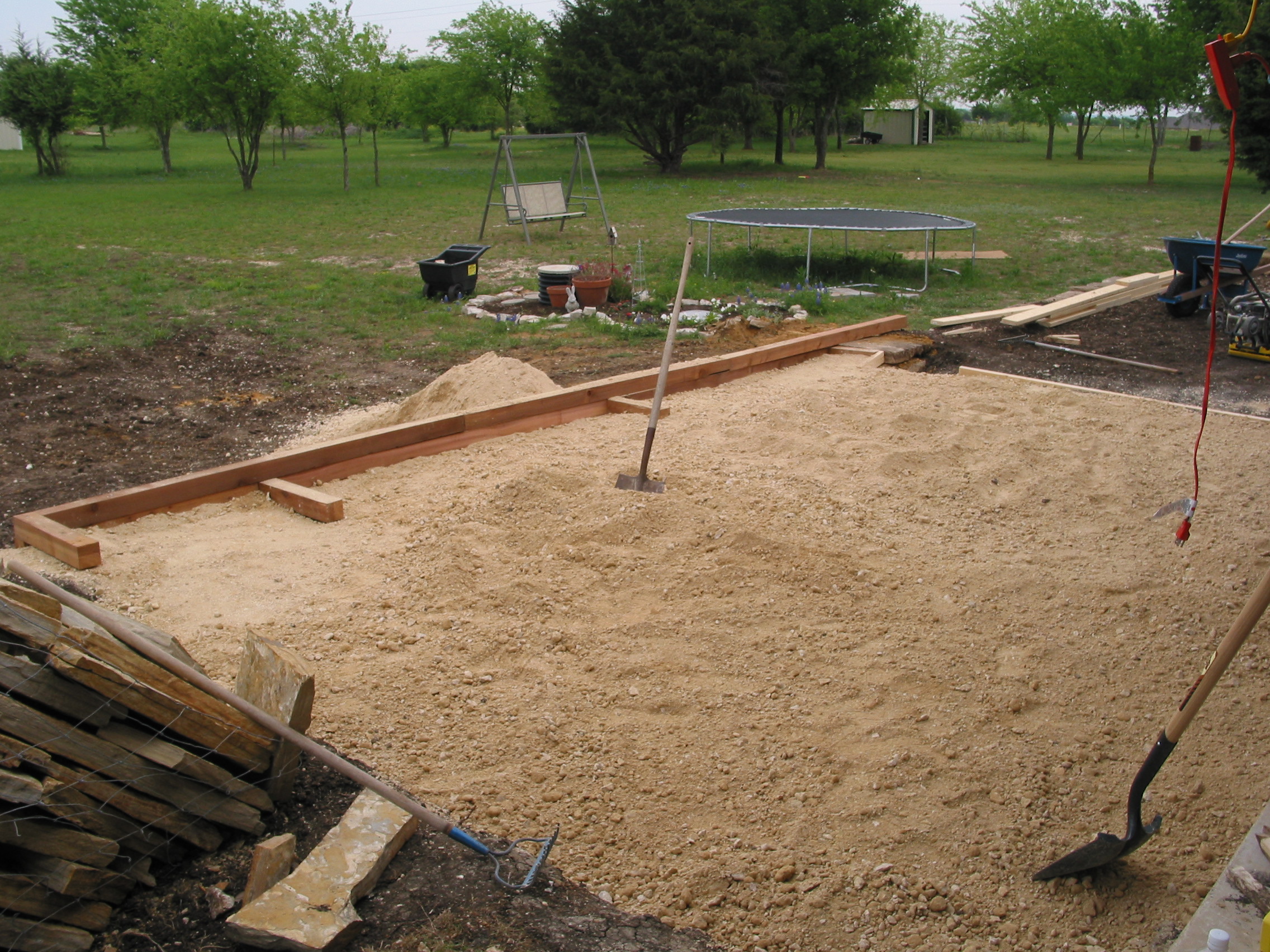 Around this time we decided to remove the existing concrete retaining wall, and build a cedar one instead.