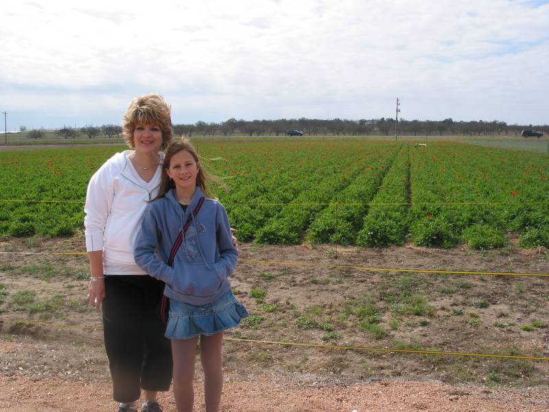 Michelle and Holly in near a poppy field