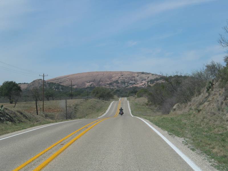 Enchanted Rock looms in the distance