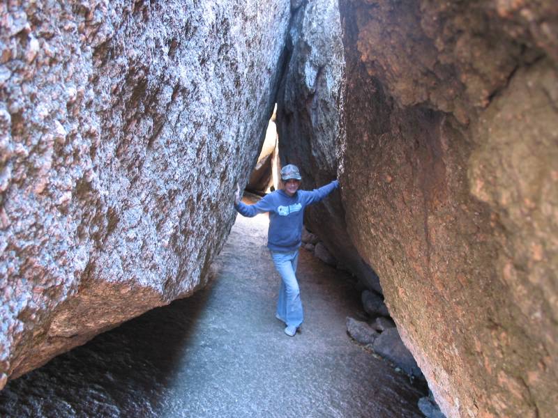 Holly amongst some big boulders