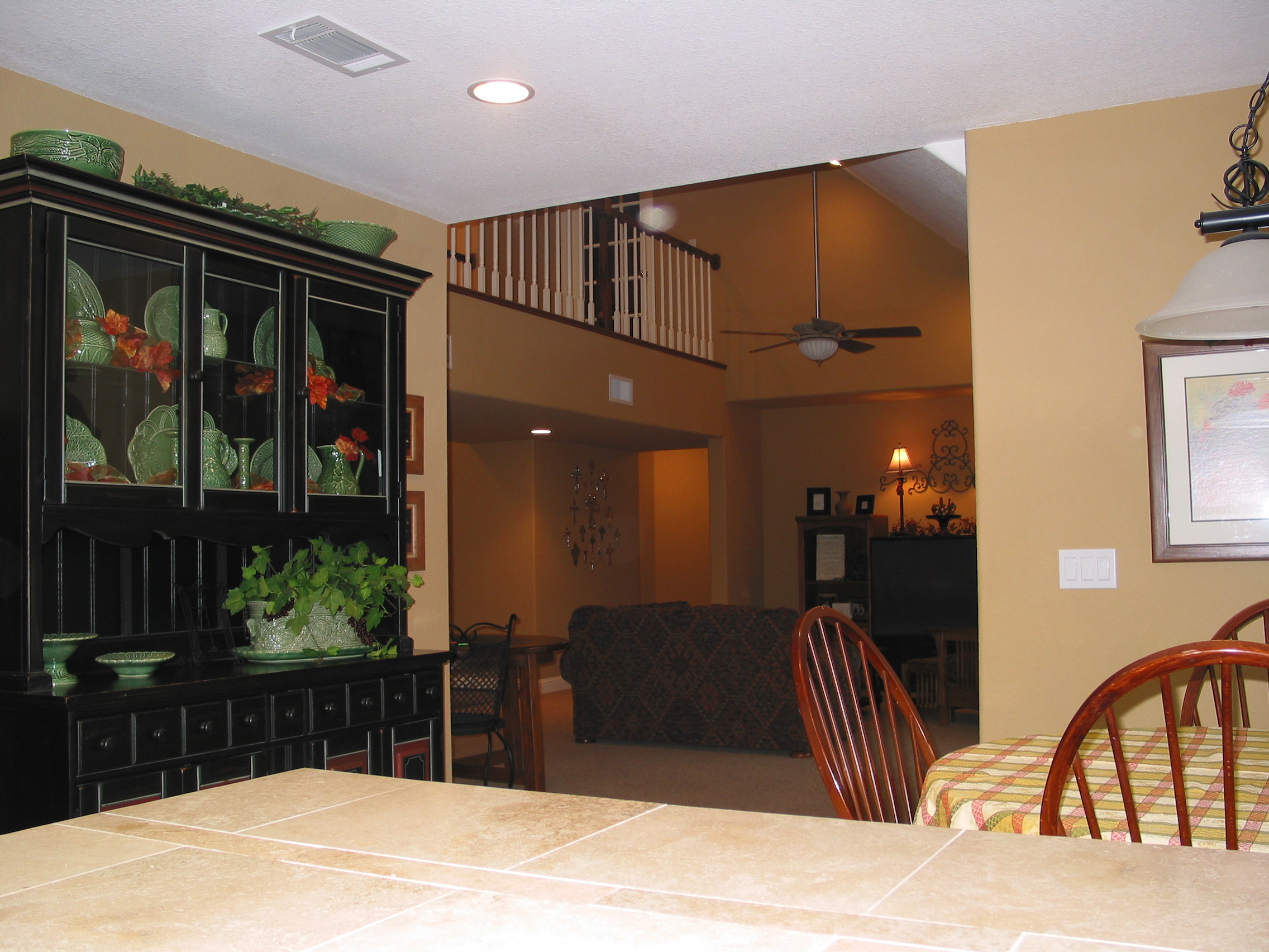 From kitchen, looking over bar into living room