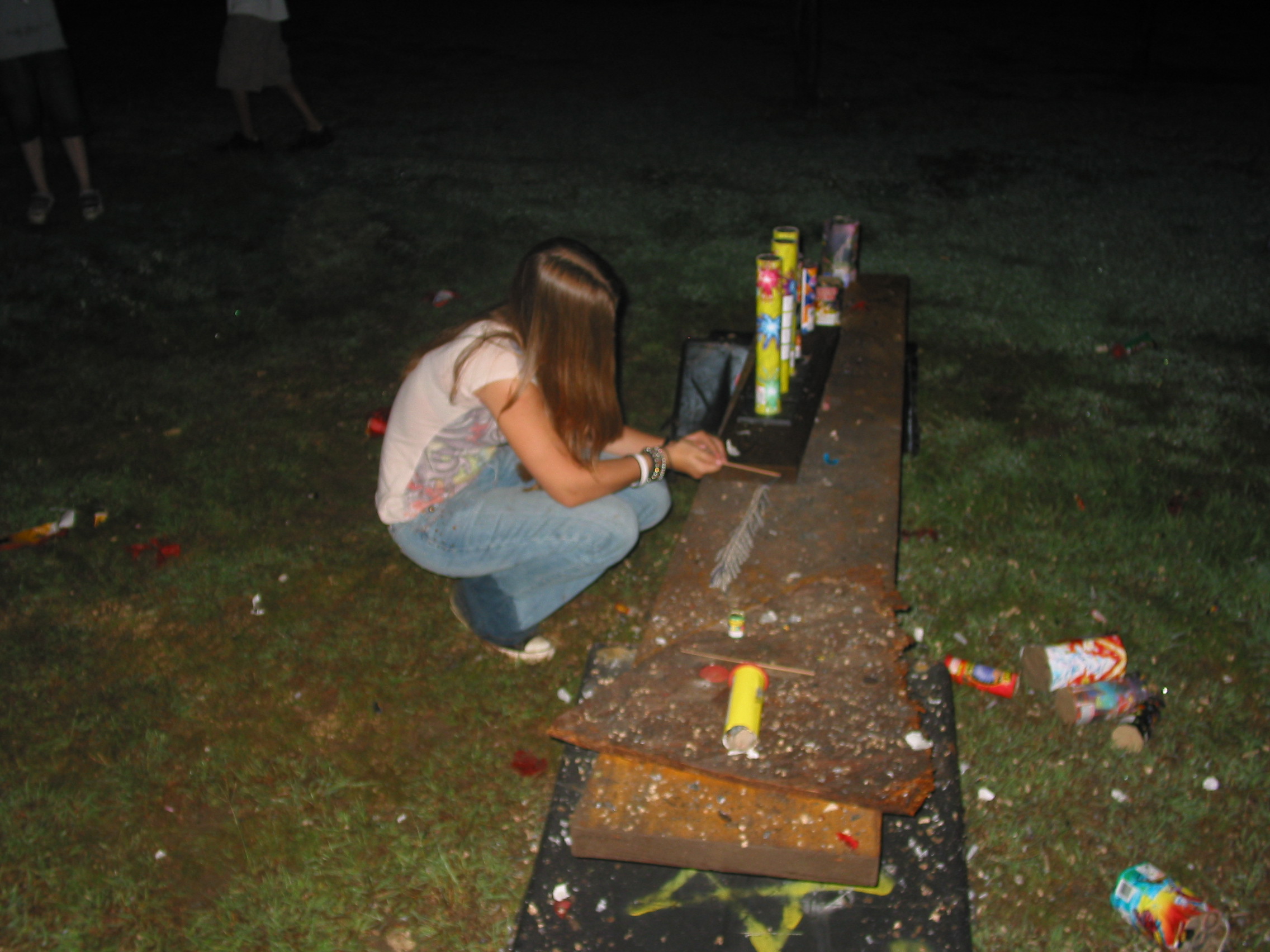 Kasey is setting off a whole string of firecrackers