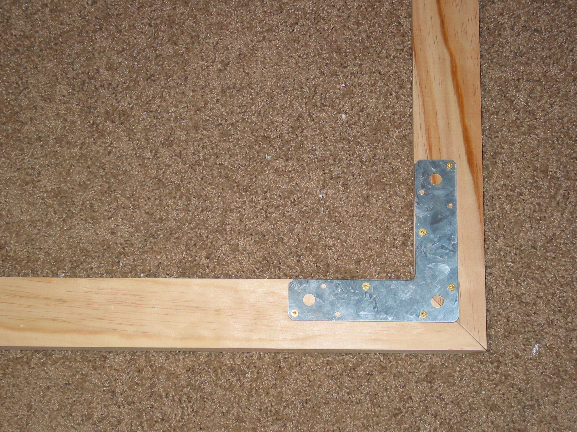 Screen frame corner bracket.