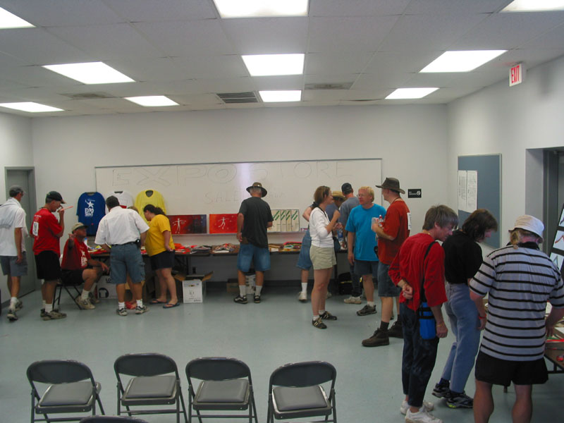 Participants and public milling about the exhibits