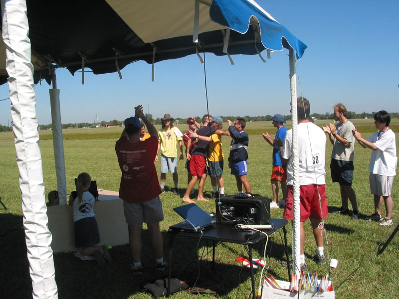 Champion Adam Ruhf is congratulated by the other Expert Division top ten