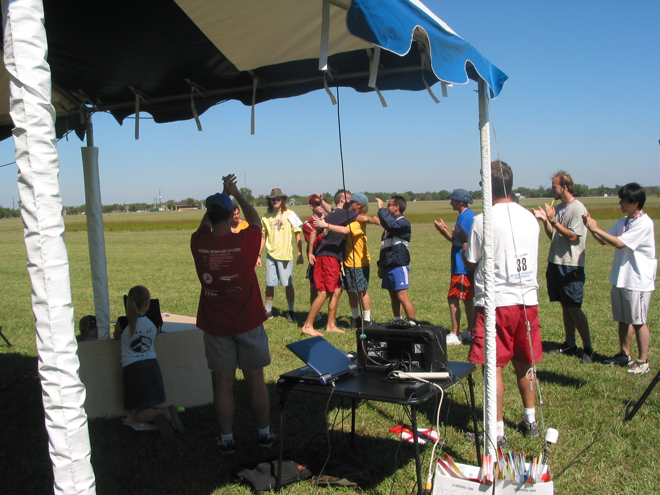 Champion Adam Ruhf is congratulated by the other Expert Division top ten